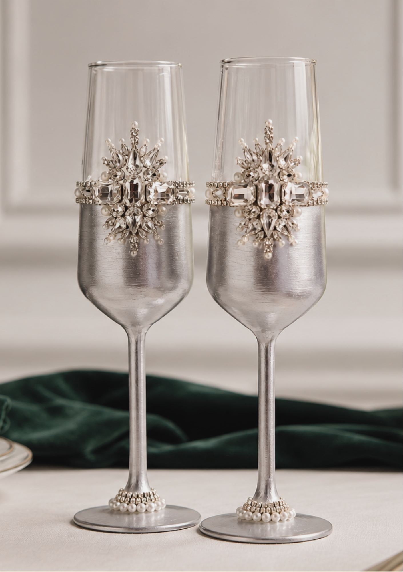Pair of Zahra Razvi Luna luxury champagne flutes, hand-painted silver with ornate crystal and pearl embellishments.